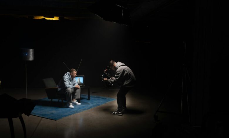 Empty television studio with professional lighting and camera equipment