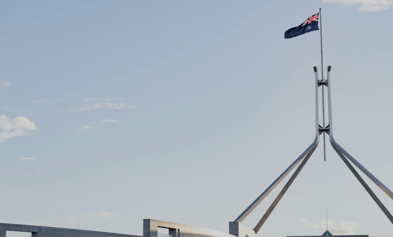 State government building with American flag, representing gubernatorial leadership and political authority