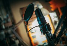 Professional podcast recording setup with microphone and audio equipment in studio environment