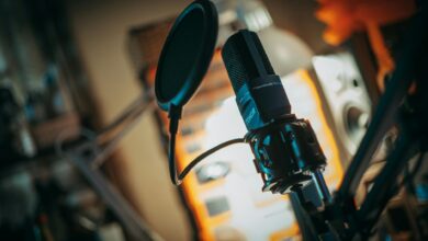 Professional podcast recording setup with microphone and audio equipment in studio environment