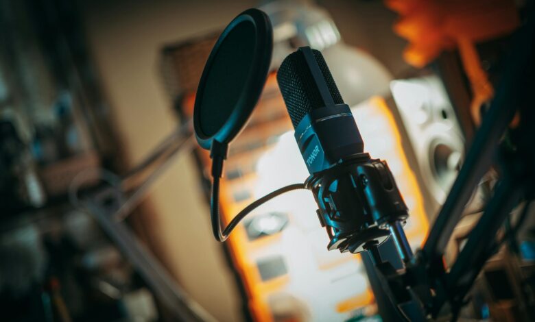 Professional podcast recording setup with microphone and audio equipment in studio environment