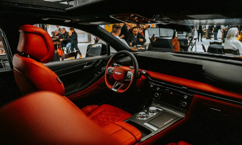 Interior view of a luxury sedan showing premium leather seats and dashboard