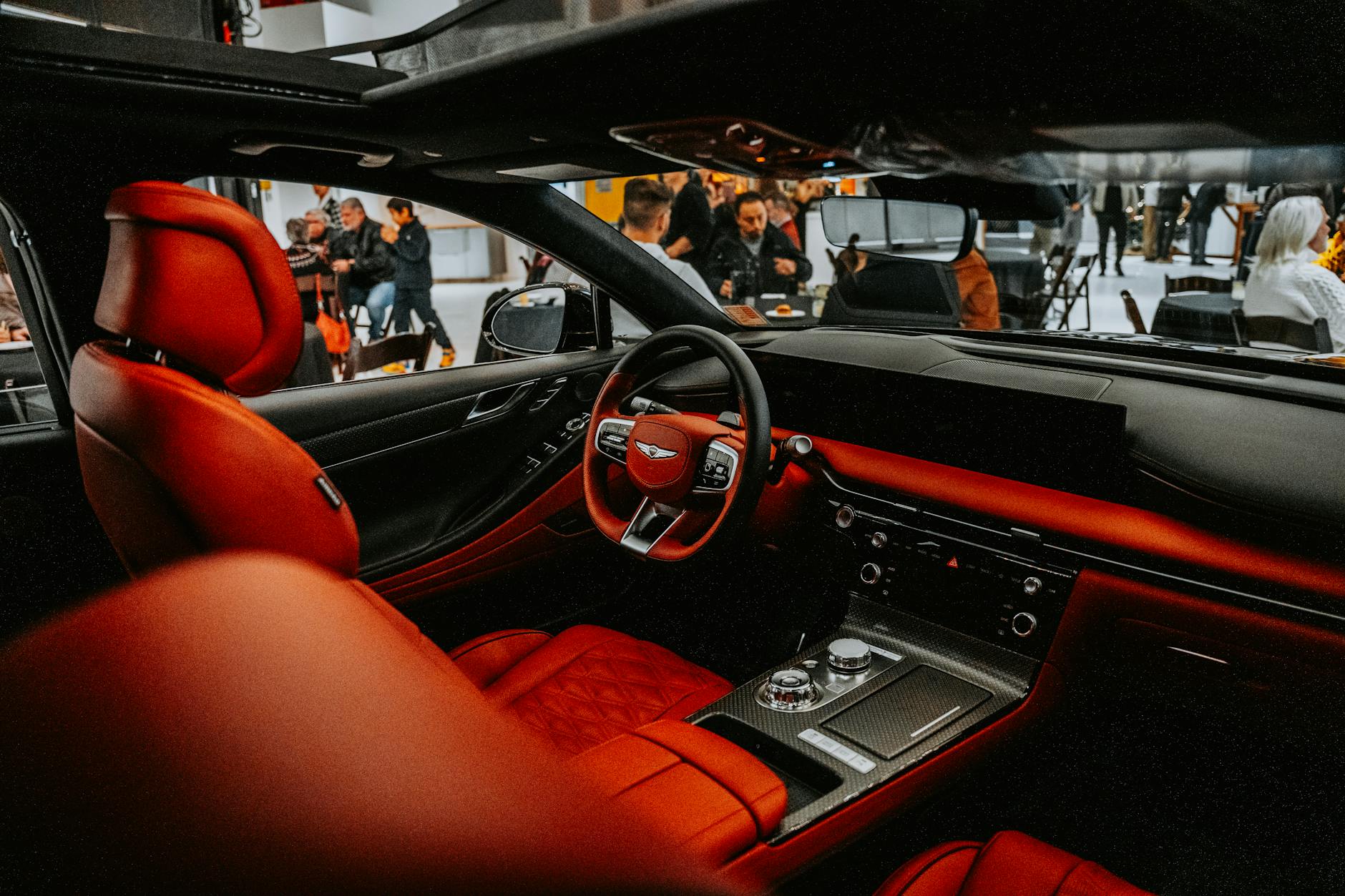 Interior view of a luxury sedan showing premium leather seats and dashboard