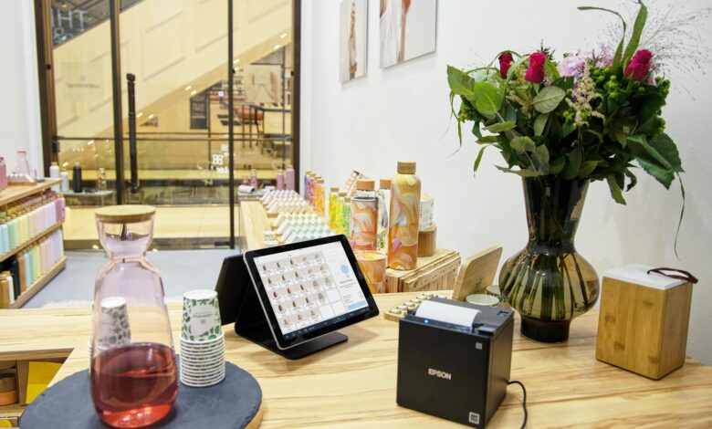 Modern retail checkout counter with traditional cashier station and point-of-sale system