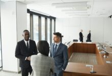 Business professionals in a modern conference room discussing investment strategies and venture capital decisions