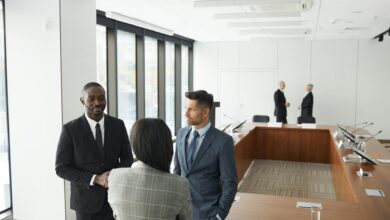 Business professionals in a modern conference room discussing investment strategies and venture capital decisions