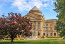 Modern courthouse building representing state legal institutions coordinating antitrust enforcement