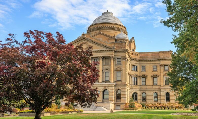 Modern courthouse building representing state legal institutions coordinating antitrust enforcement