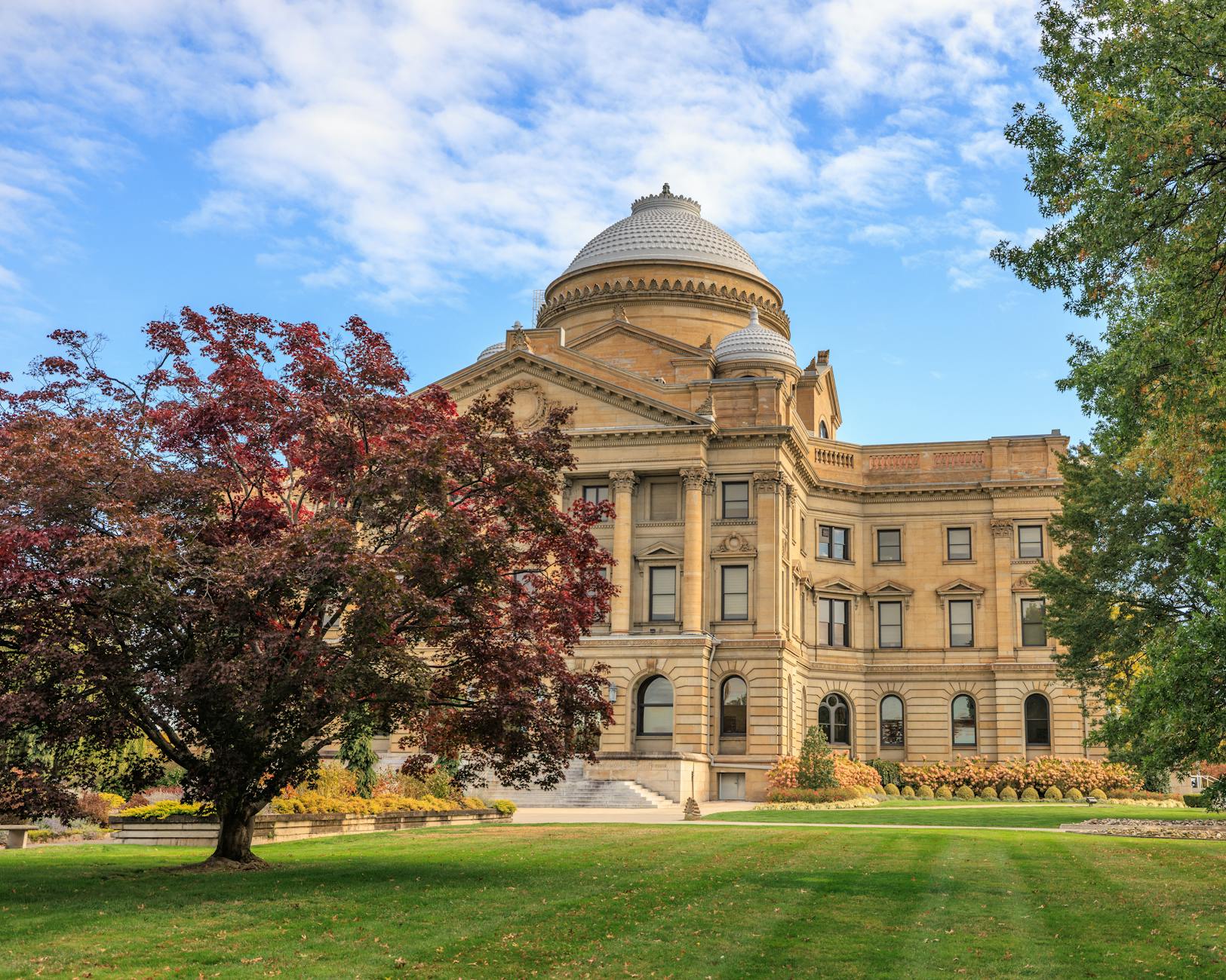 Modern courthouse building representing state legal institutions coordinating antitrust enforcement