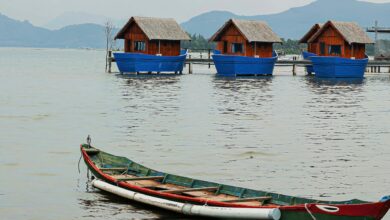 Modern floating homes on calm water with traditional architecture design