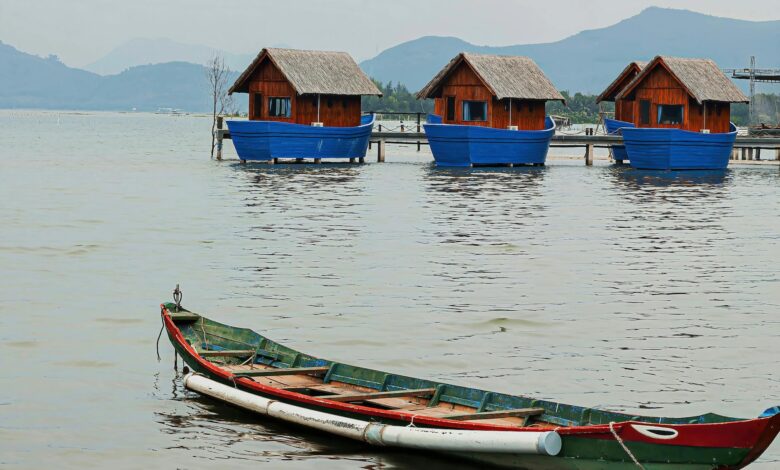 Modern floating homes on calm water with traditional architecture design