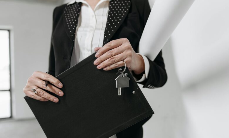 House keys on wooden table representing home buying decisions