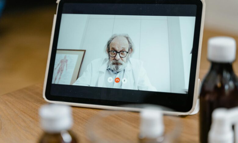 Senior patient consulting with healthcare provider about insurance options and medical care access