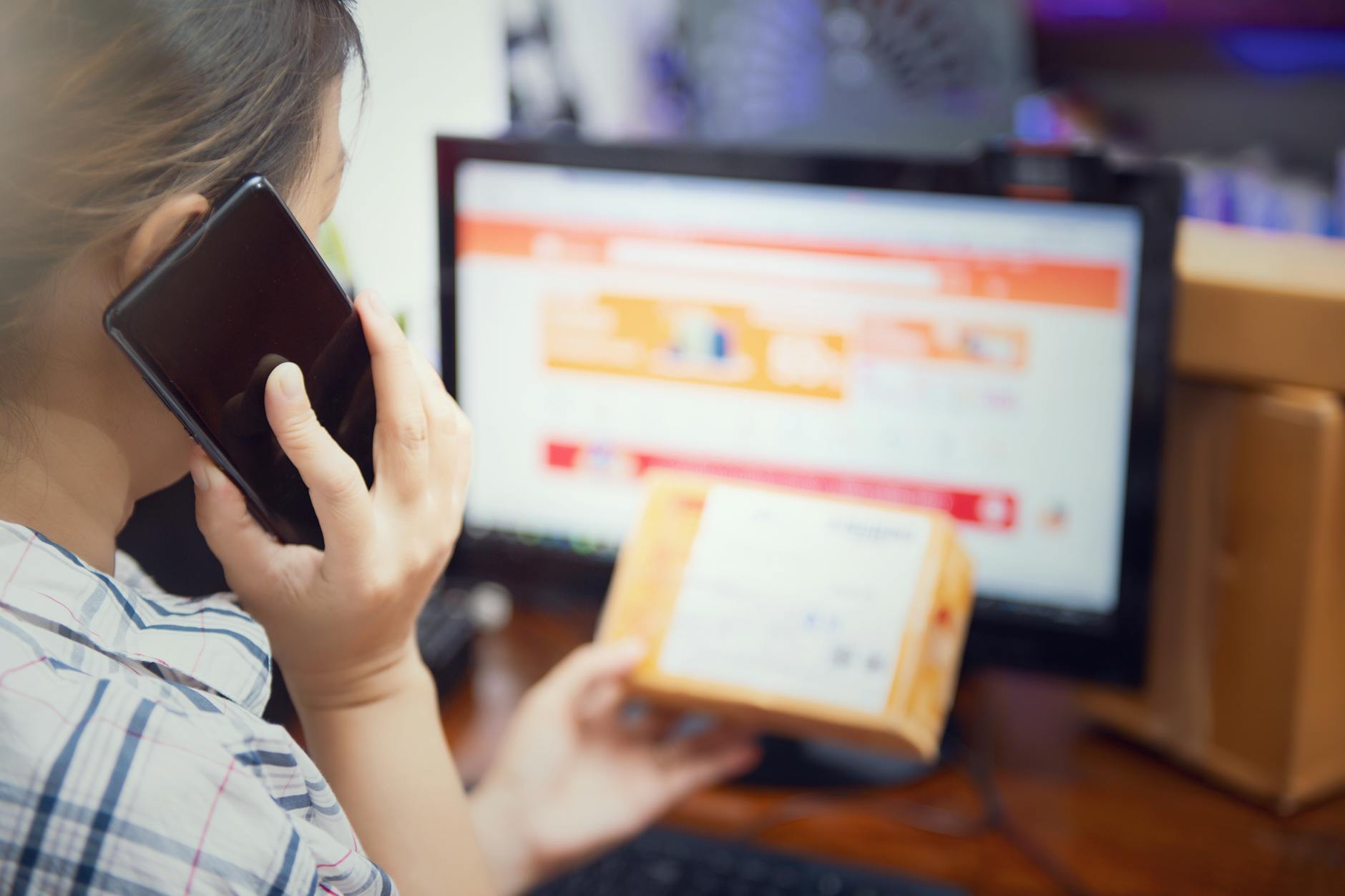 Person using smartphone for online shopping, representing mobile commerce integration