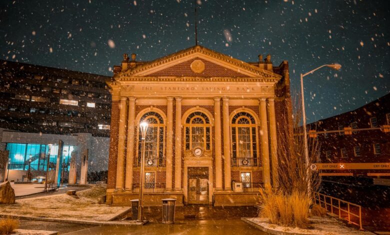 Modern regional bank building exterior with glass facade and corporate signage