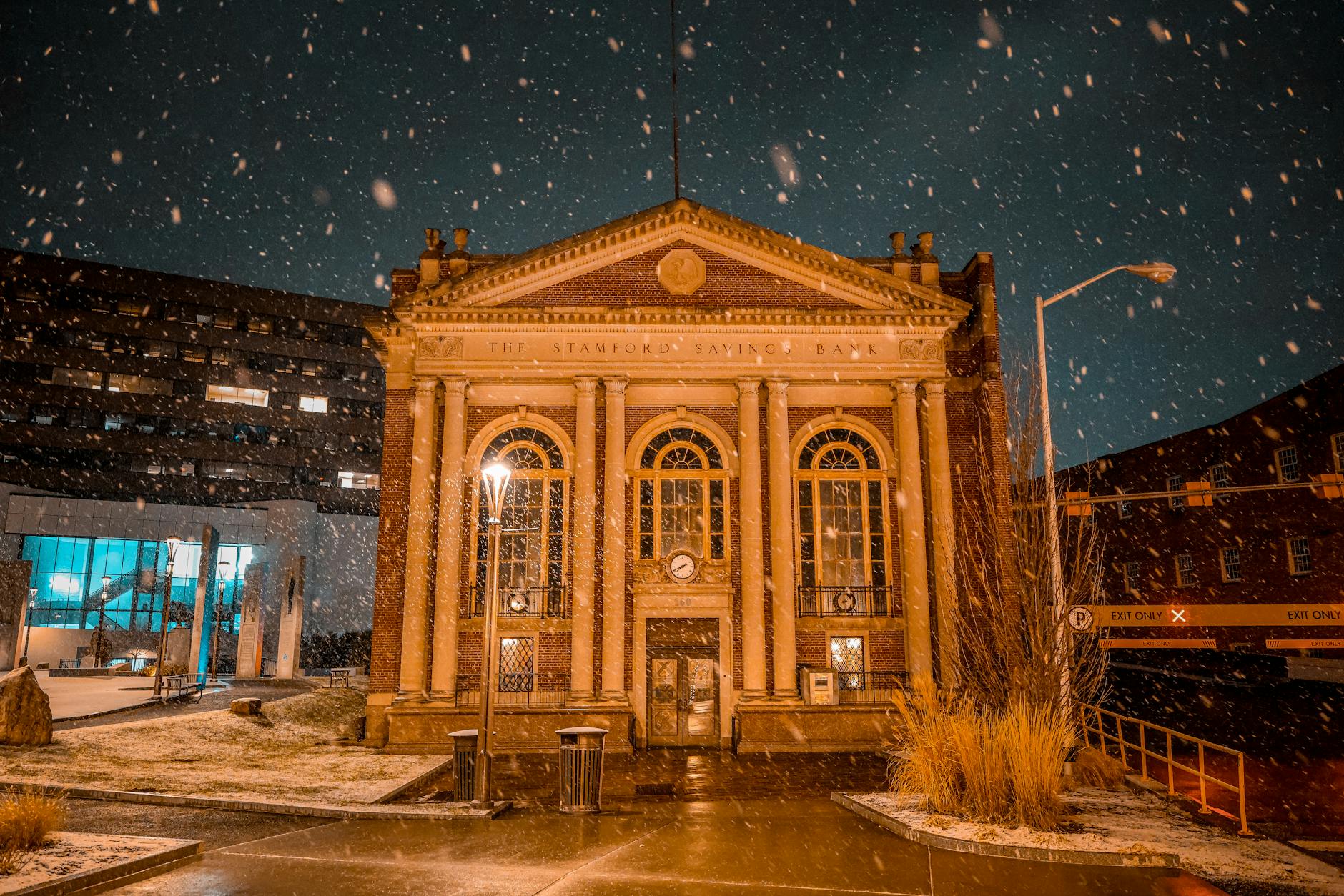 Modern regional bank building exterior with glass facade and corporate signage