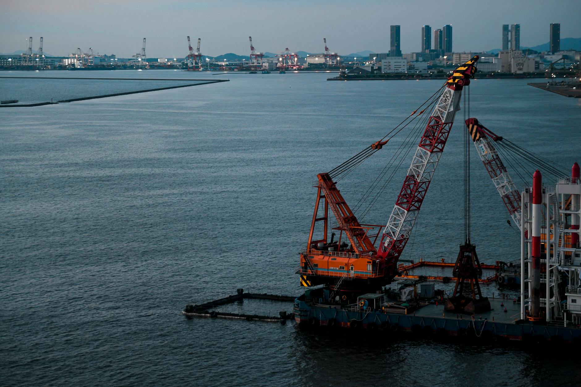 Marine construction equipment working on waterfront development project