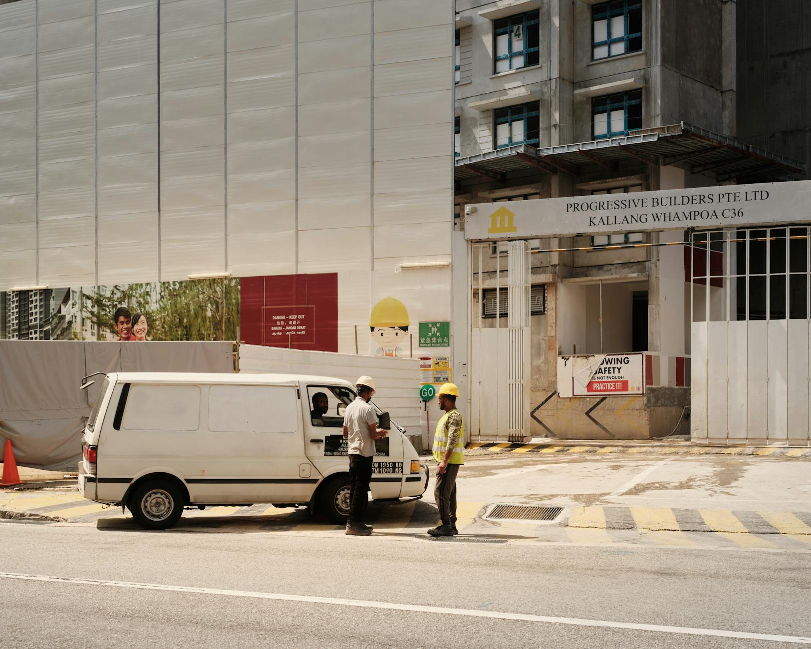 Construction workers in hard hats representing blue-collar union membership