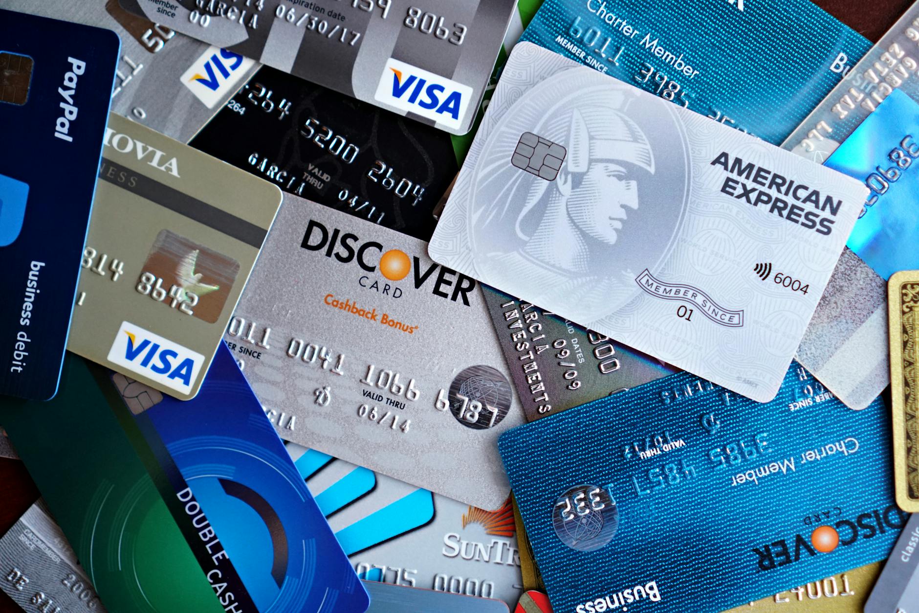 Stack of various credit cards showing traditional payment methods