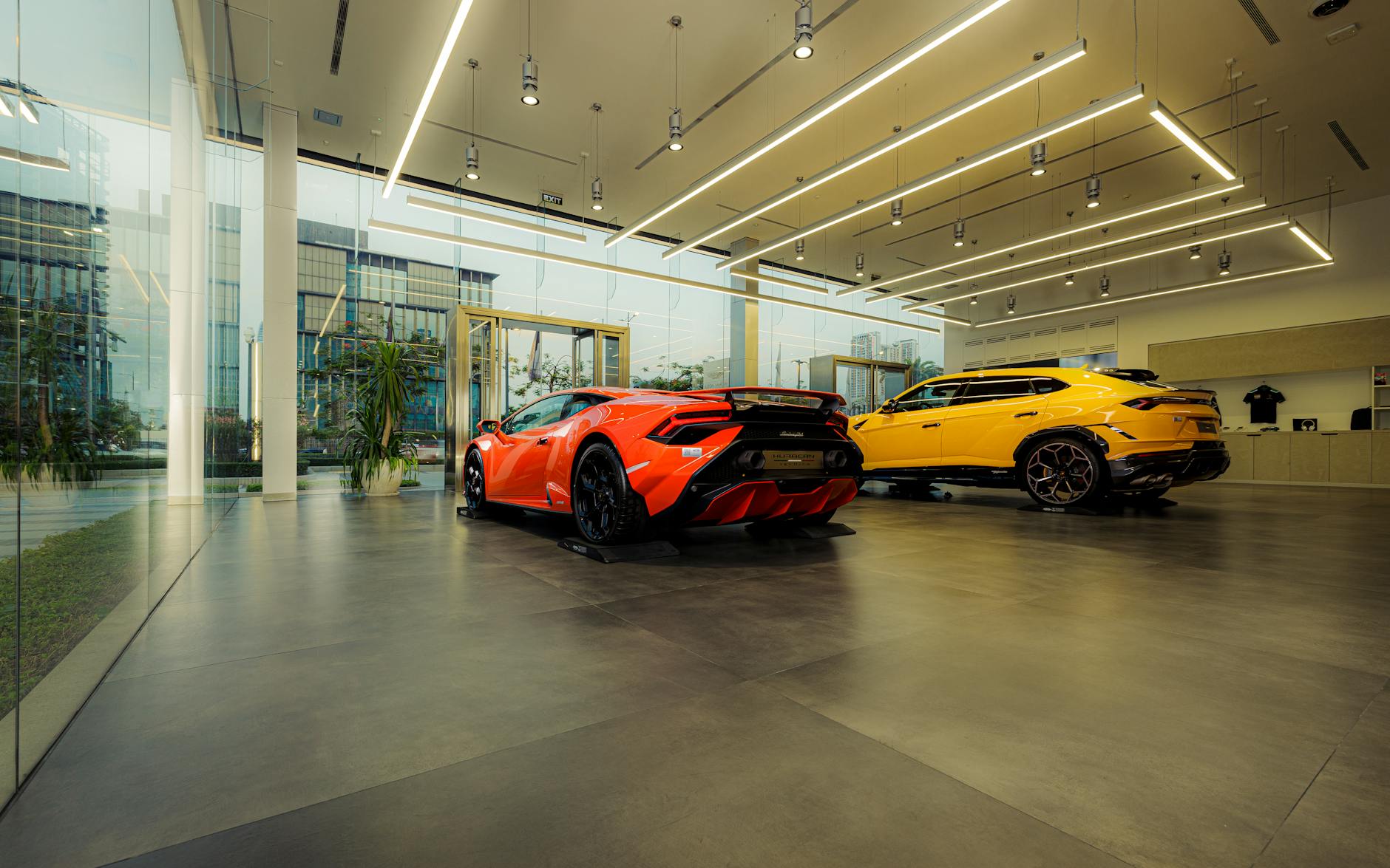 Modern automotive showroom with luxury vehicles on display