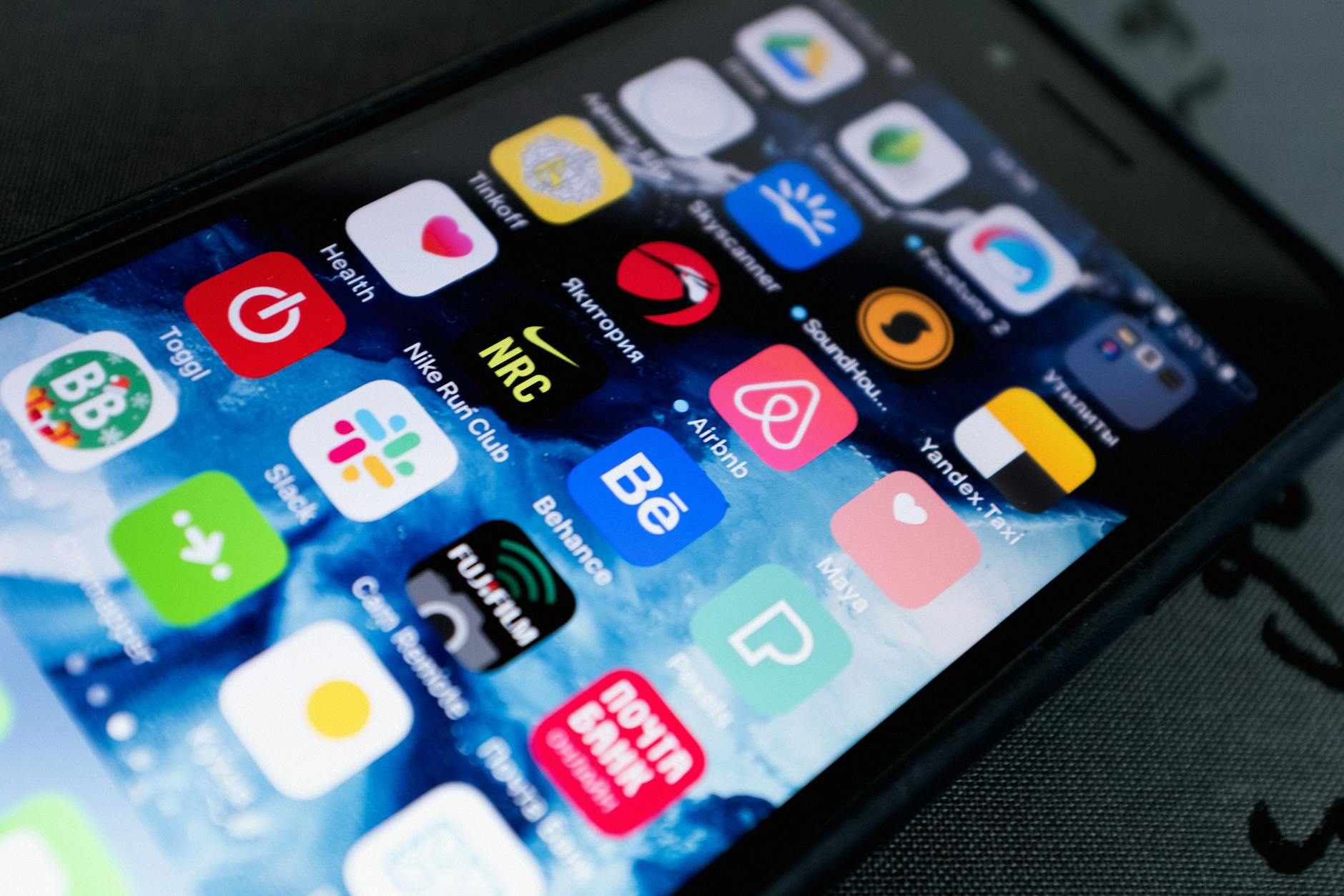 Smartphone displaying multiple streaming service apps on home screen
