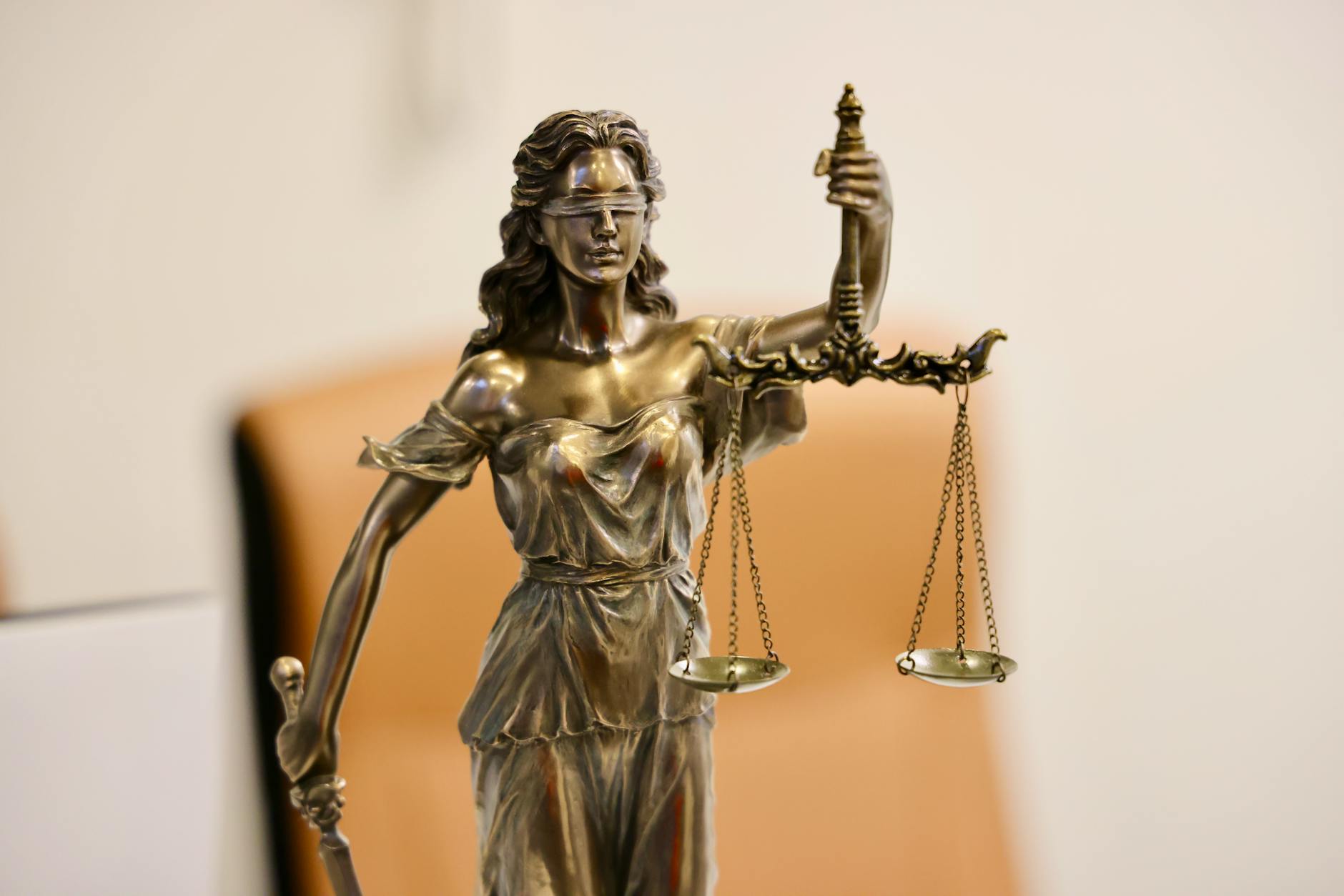 Traditional scales of justice symbolizing legal and ethical considerations in political technology