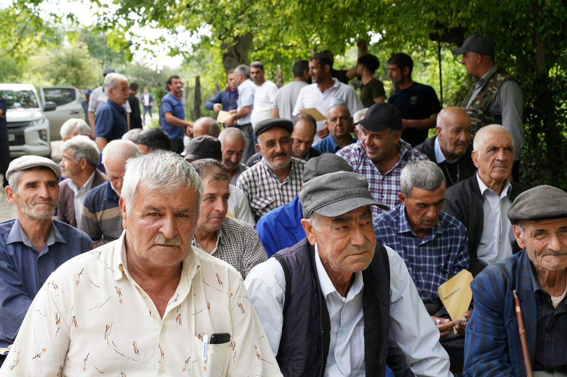 Local residents attending a community town hall meeting in a municipal building