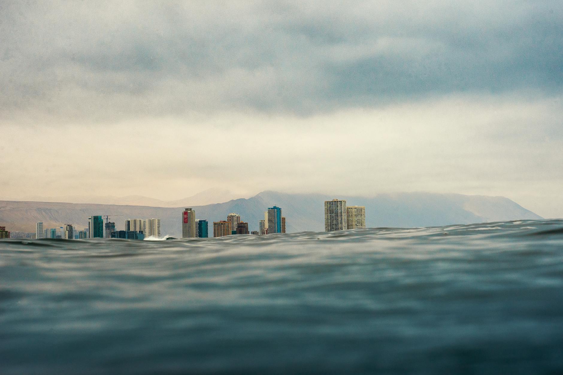 Coastal city skyline with ocean view showing urban development near water