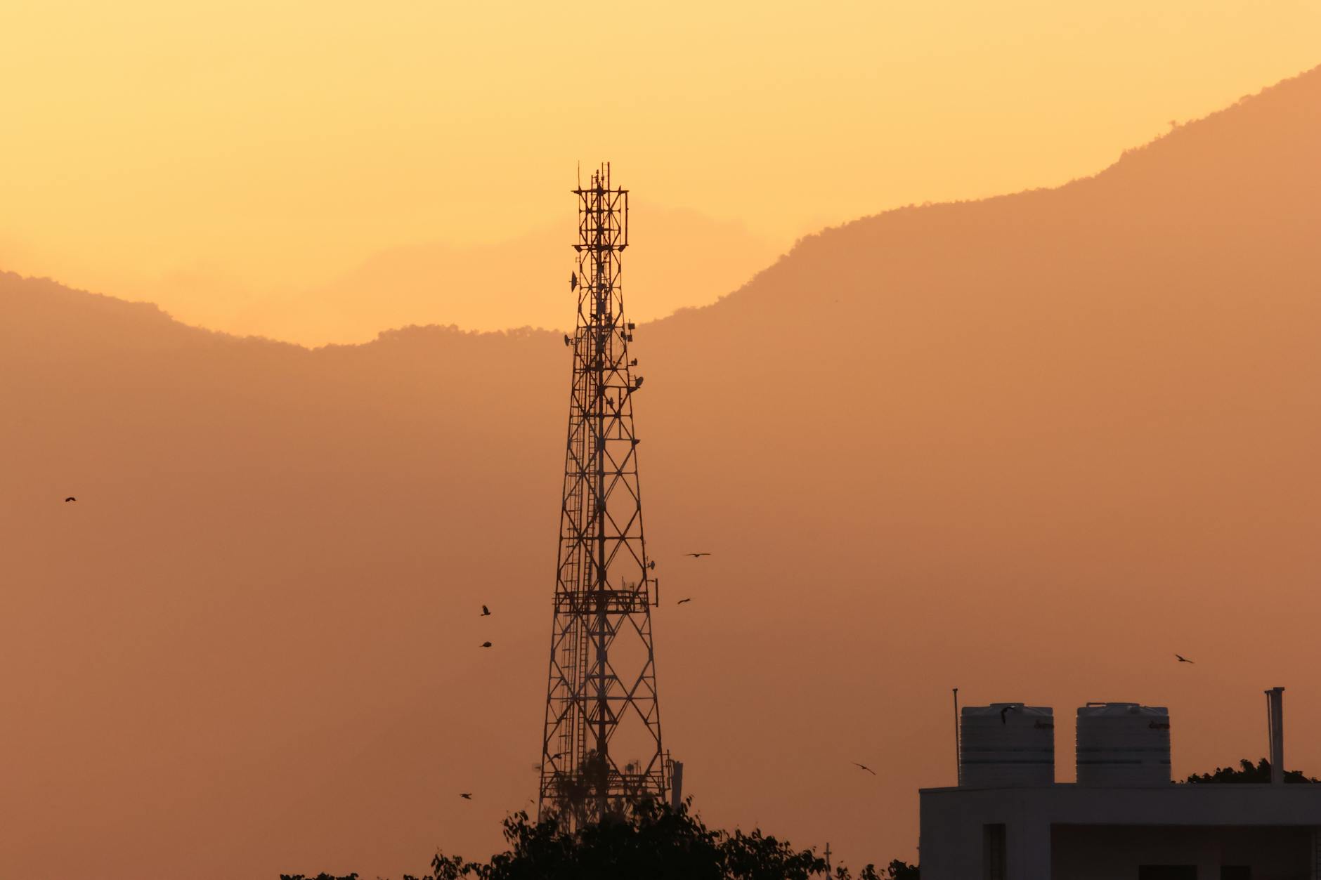 Telecommunications tower in rural landscape providing internet connectivity