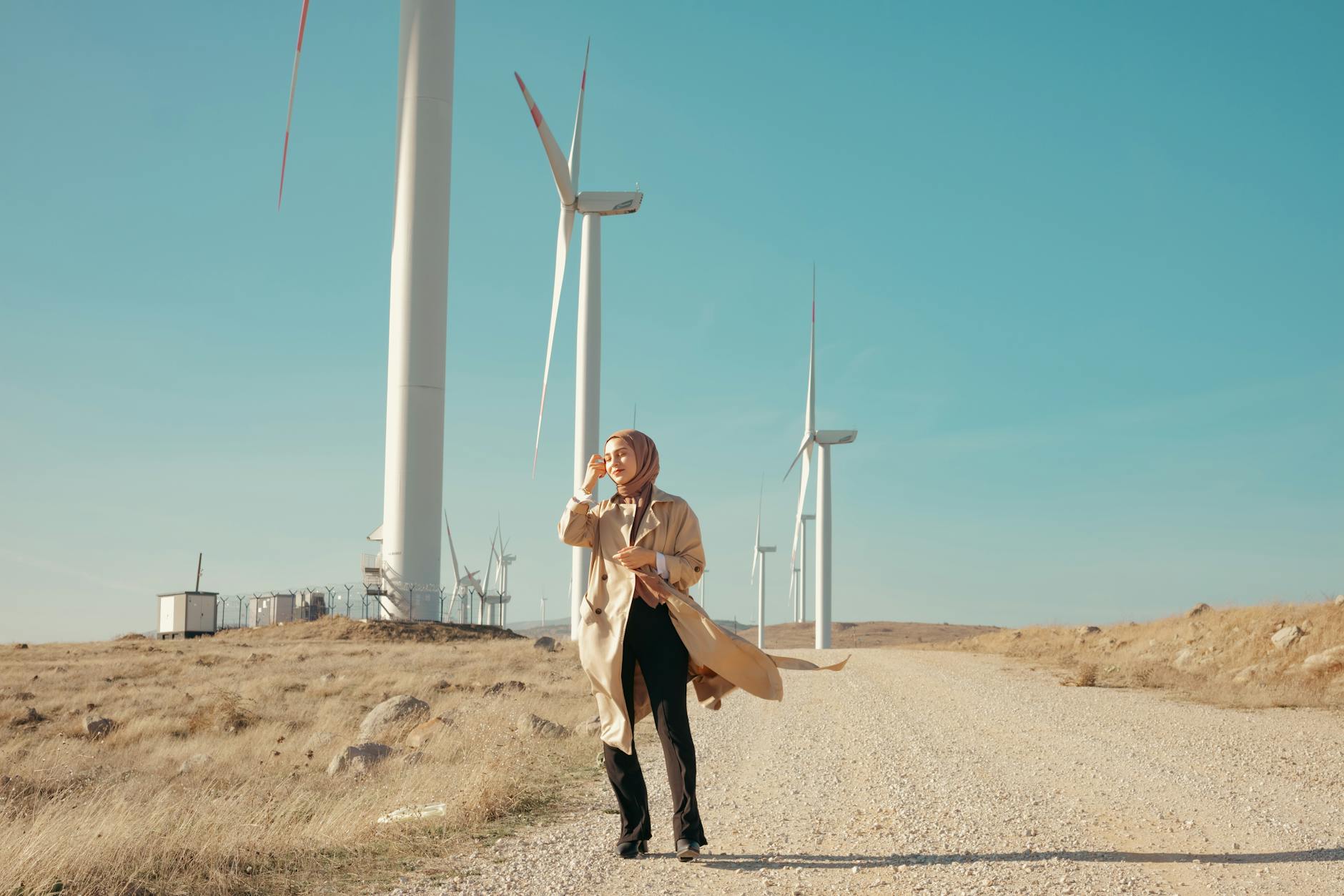 Person holding clothing items representing sustainable fashion choices