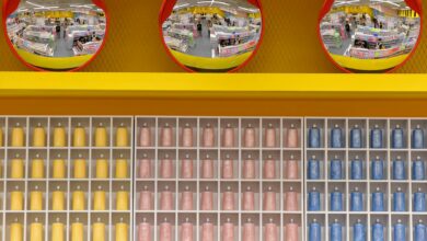 Wide interior view of a warehouse-style retail store with high shelving and bulk products