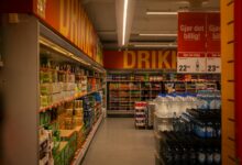 Interior of a discount retail store with shelves of low-priced merchandise