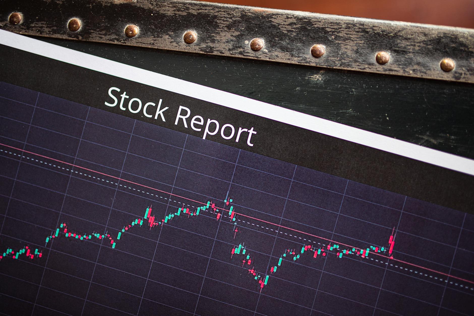 Financial chart showing declining stock market trend on a screen