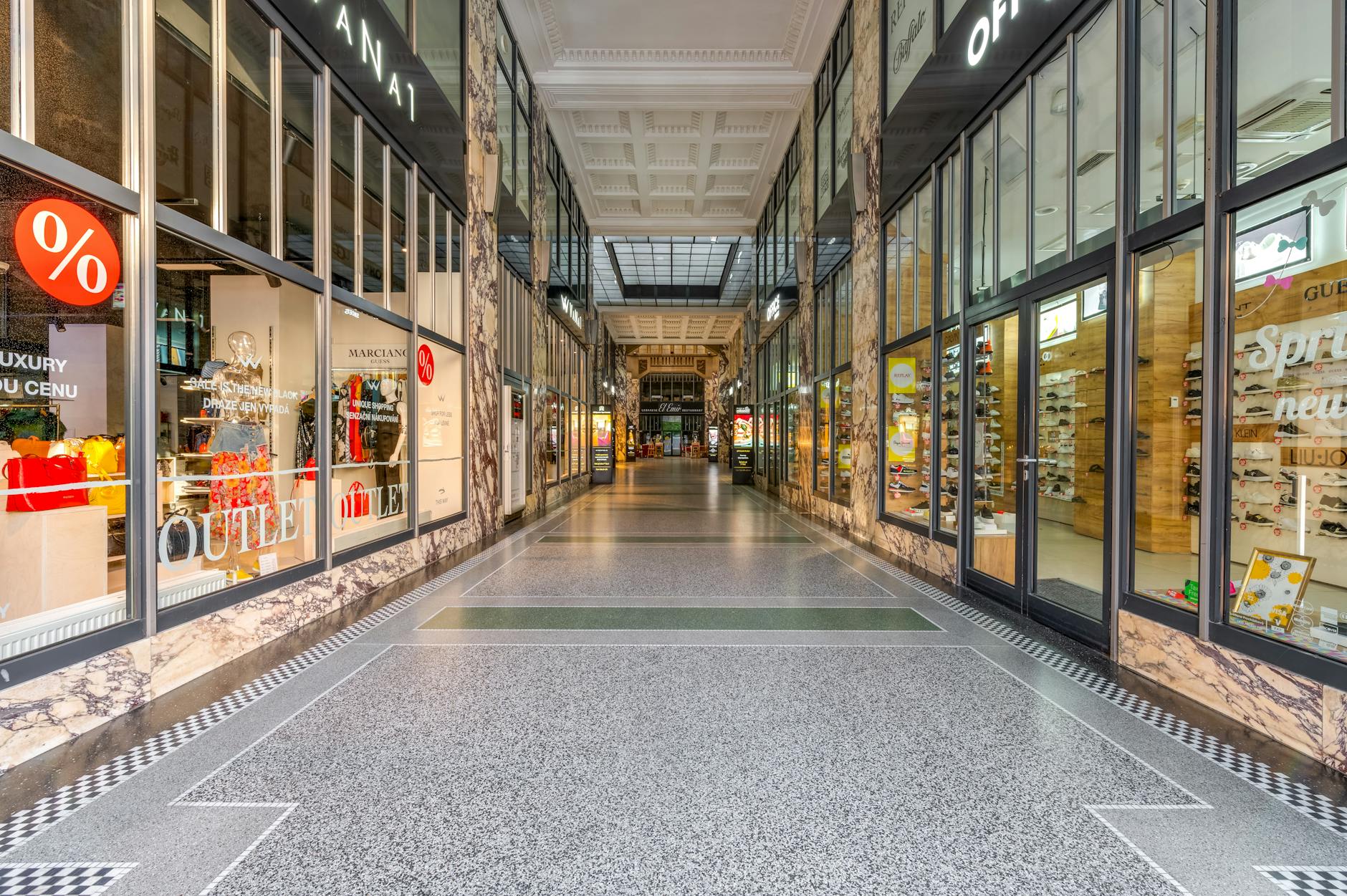 Vacant anchor retail space inside a shuttered department store in an American shopping center