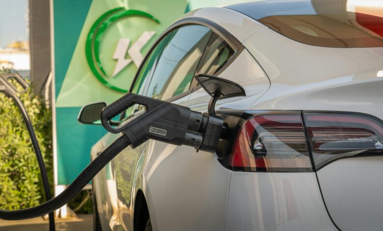 Electric vehicle charging station at a commercial fuel stop location