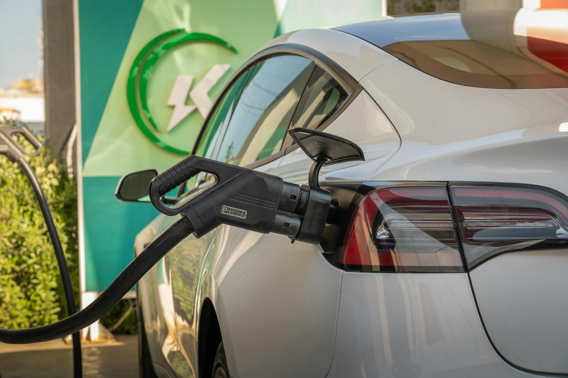 Electric vehicle charging station at a commercial fuel stop location