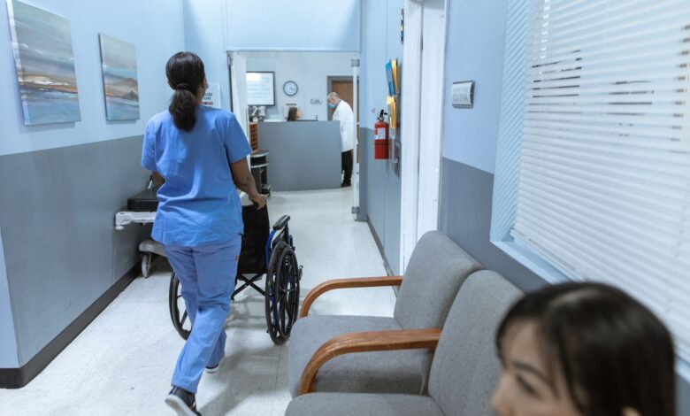 Interior of an urgent care clinic waiting room with medical signage
