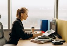 Accountants working at desks in a modern office environment