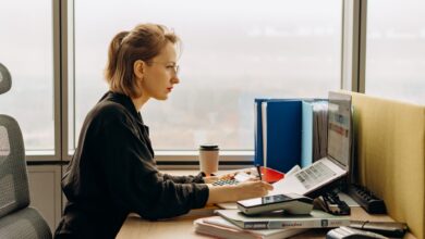 Accountants working at desks in a modern office environment