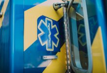 An ambulance parked outside a regional emergency services station