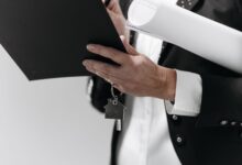 Documents and pen on a desk during a real estate closing transaction