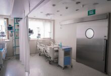Empty hospital corridor representing gaps in healthcare provider networks