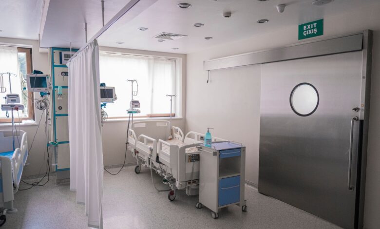 Empty hospital corridor representing gaps in healthcare provider networks