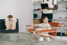 A child working with a therapist during a pediatric therapy session