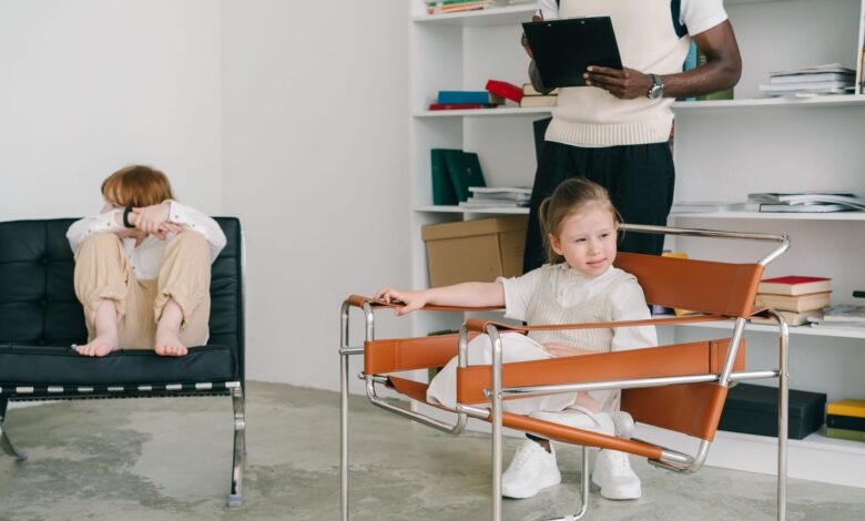 A child working with a therapist during a pediatric therapy session