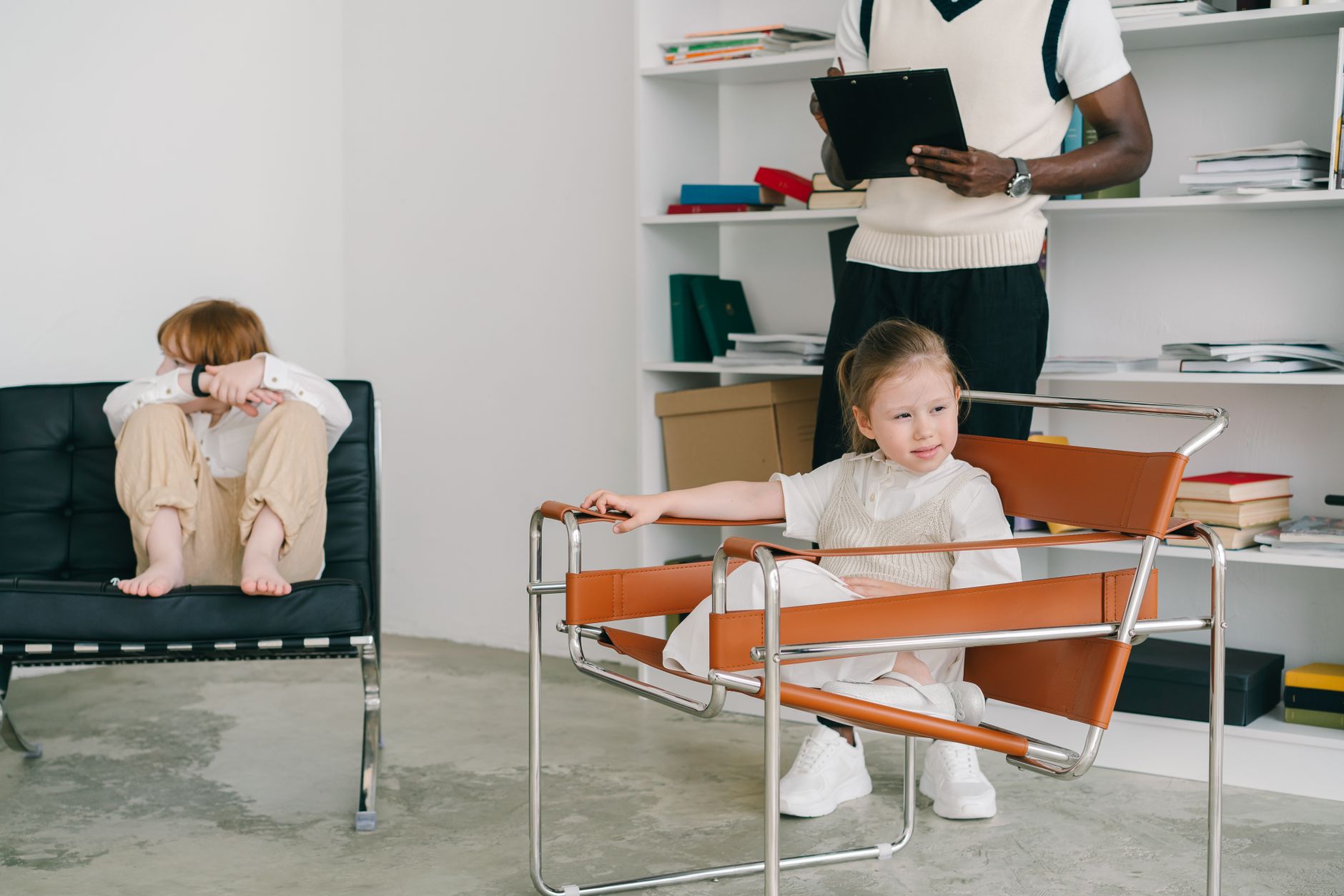 A child working with a therapist during a pediatric therapy session