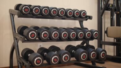 Empty fitness studio interior with exercise equipment and open floor space