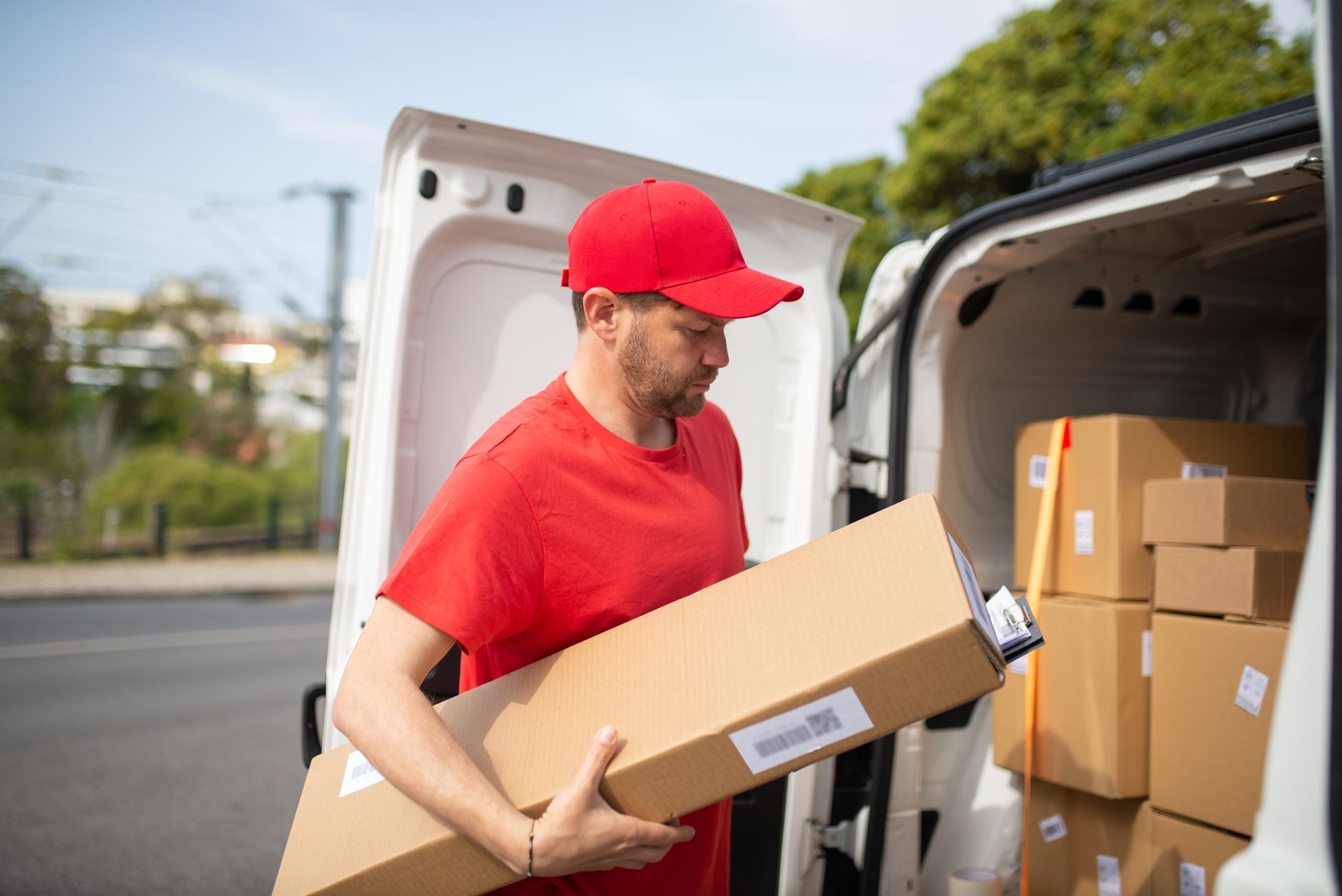 A warehouse worker scanning inventory in a distribution facility
