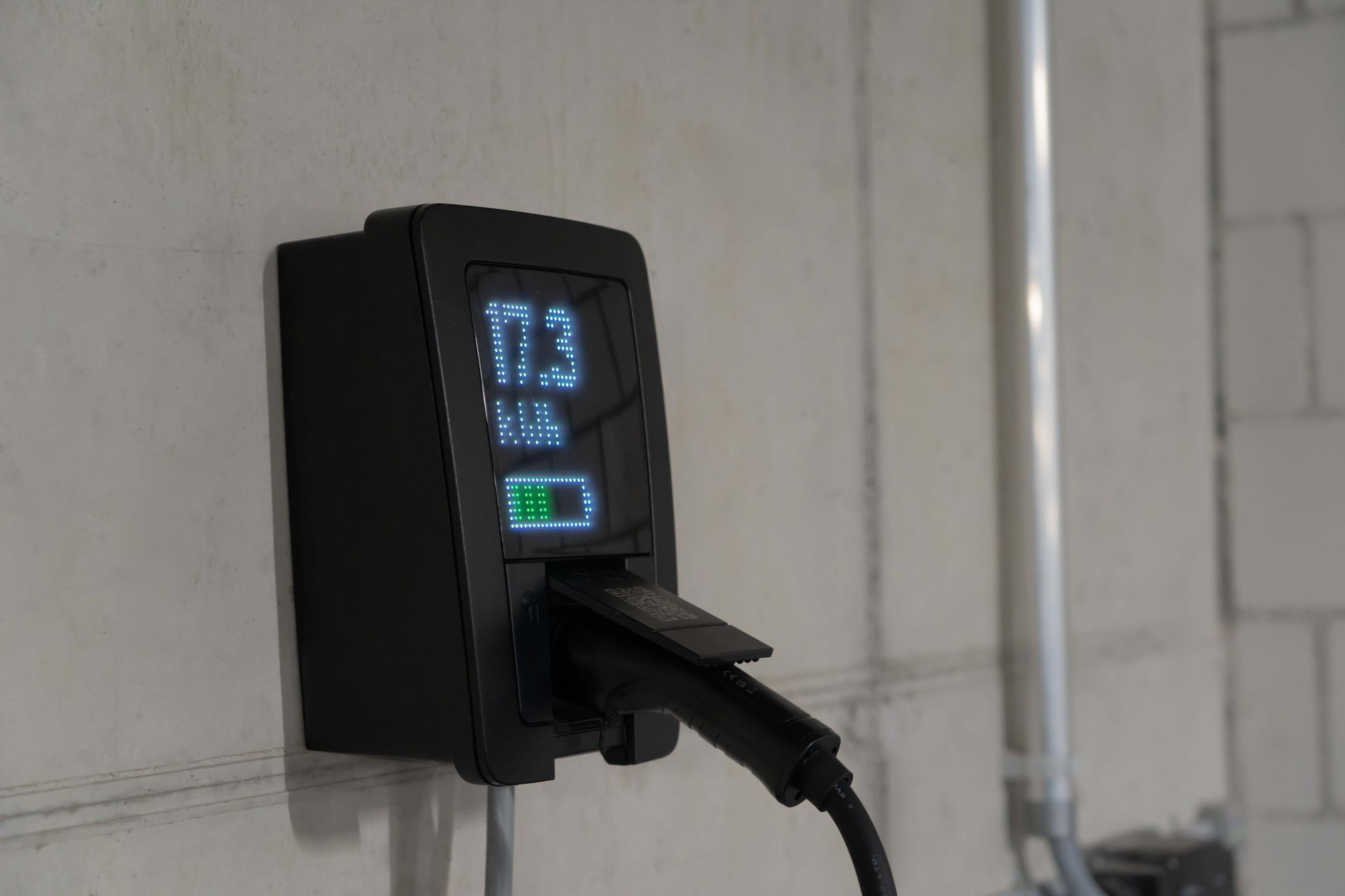 Electric vehicle fast charger along a commercial highway corridor