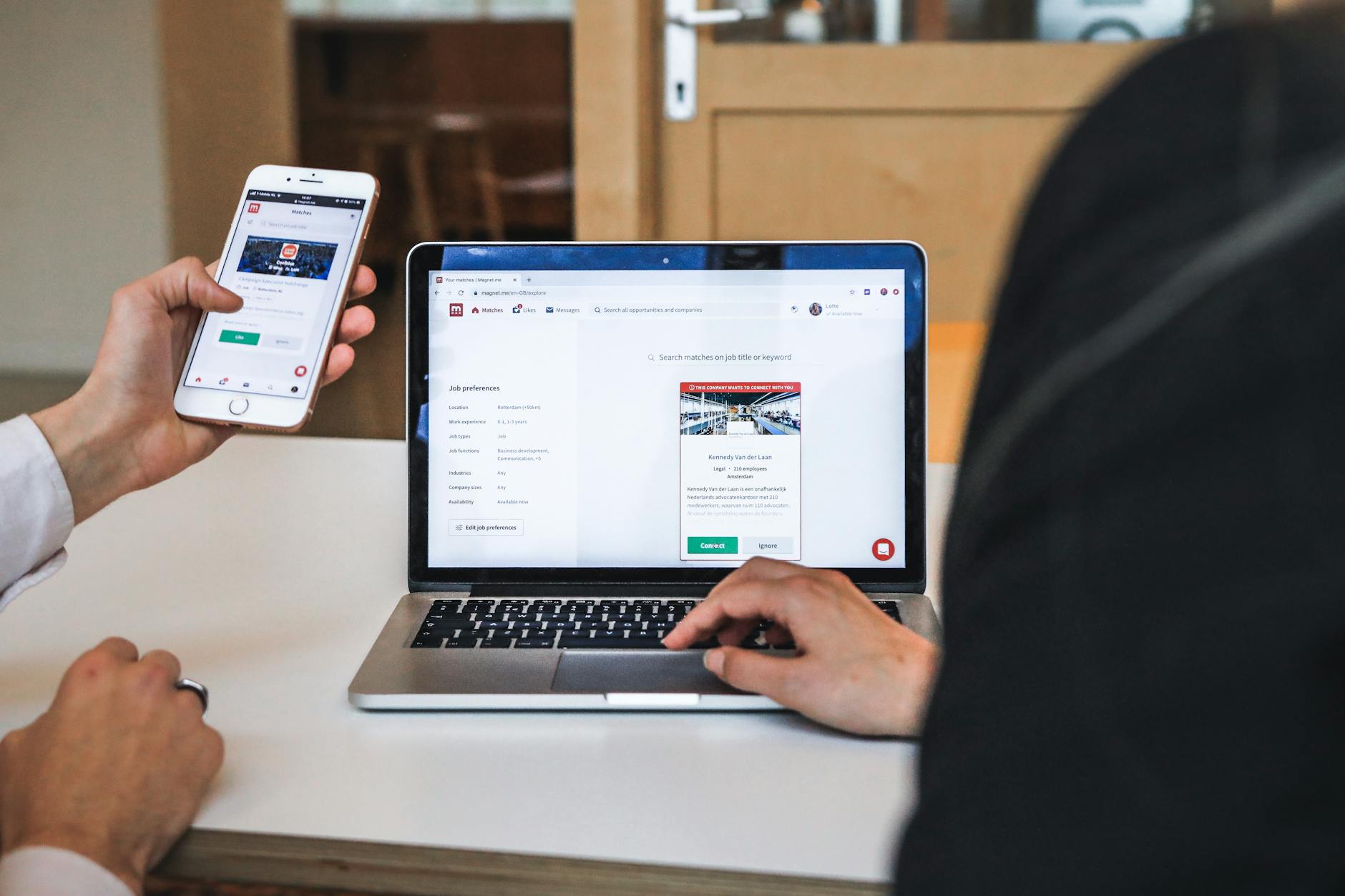 A person using a mobile app to browse job listings and shift opportunities